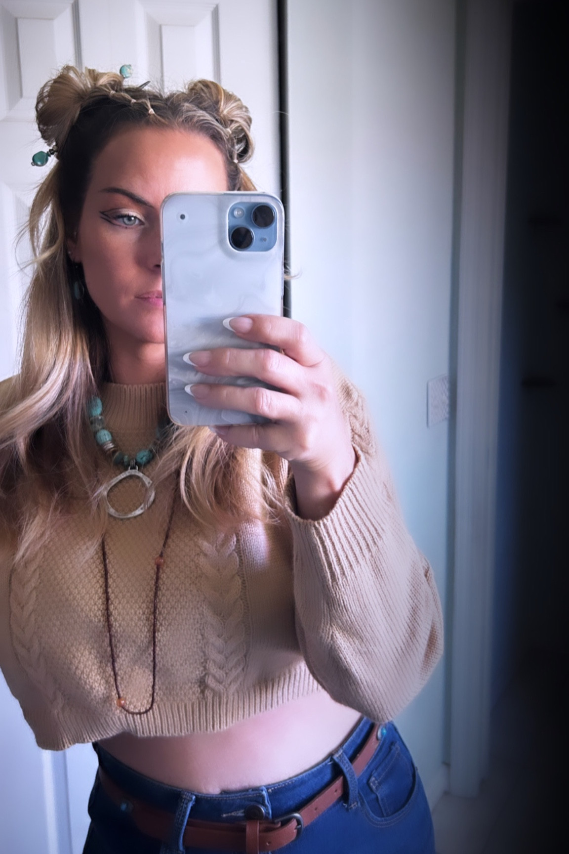 Turquoise belt. Cropped sweater. Boots. Beaded necklace. 

#LTKbeauty #LTKstyletip