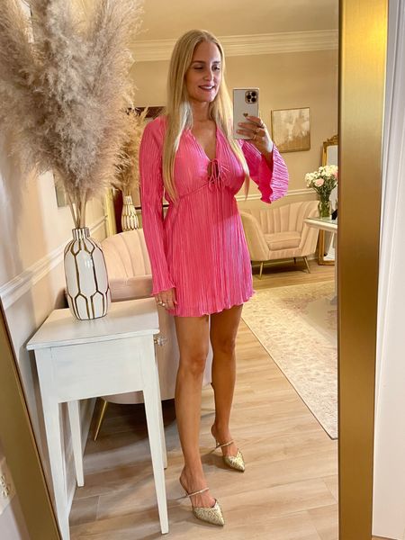 I am totally in love with this pink dress! Plisse material is having a moment and I love the soft silky texture. And the a-line shape of this dress is ultra flattering! Also comes in aqua and olive. #60sstyle #60sdress #alinedress #goldpumps 

#LTKstyletip #LTKSeasonal