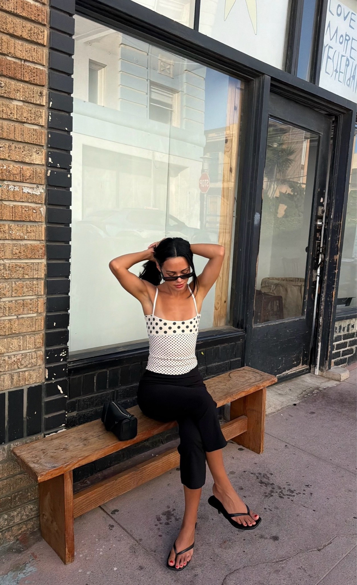 revolve polka dot top & black capris + Marc fisher heels

#LTKootd #LTKdayinmylife #LTKSeasonal
