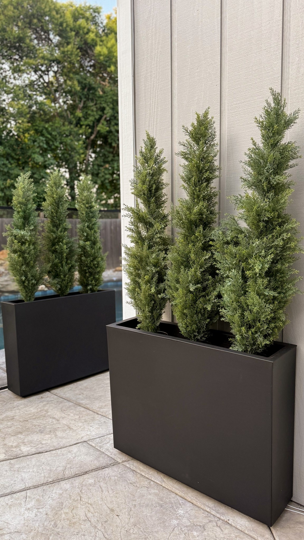 Obsessed with the way these oversized planters and faux cedar trees completely transformed this empty space and gave privacy too! 

Don’t miss @wayfair’s BIG Outdoor Sale— up to 50% off and free and fast shipping over $35 👏

@Wayfair #Wayfair #WayfairPartner

#LTKSeasonal #LTKSaleAlert #LTKHome