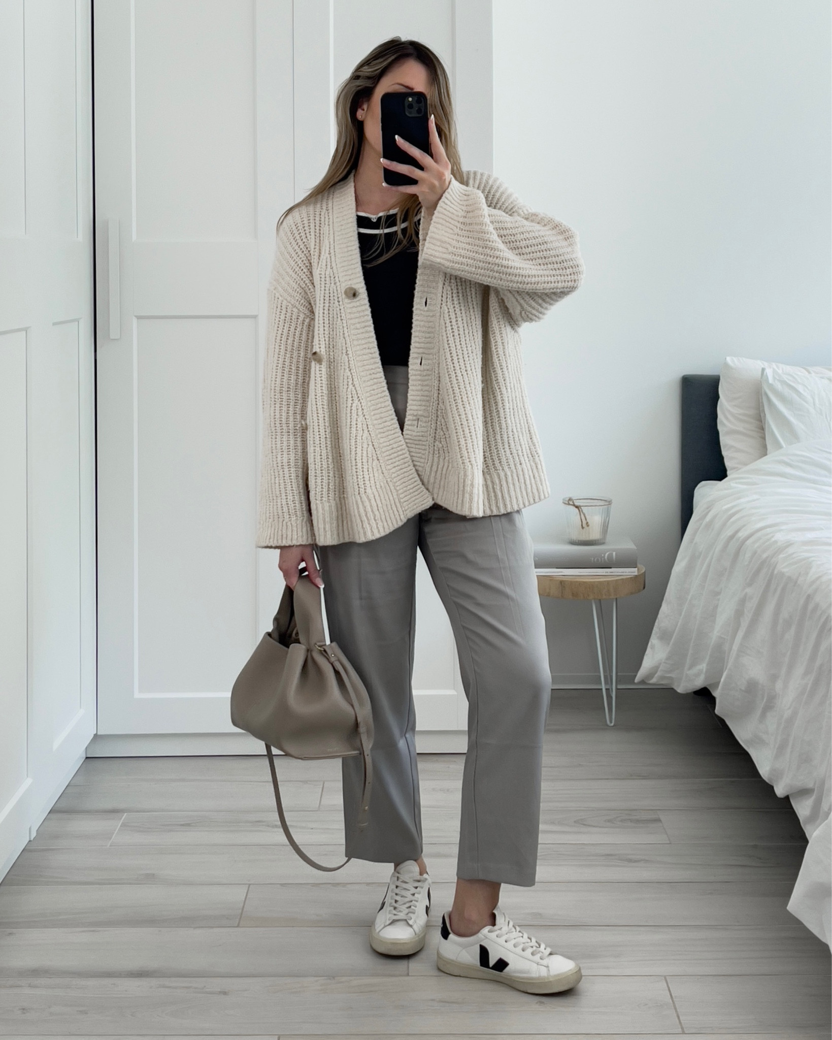 Oversized white cardigan 💭 styled with grey trousers for spring 

*oversized cardigan (true to size), &OtherStories
*contrasted top (old) from Massimo Dutti, sized 2 alternatives 
*grey trousers from NA-KD, linked alternatives 
*campo sneakers from Veja (fit true to size
*nb9 bag from Polène 

#LTKSeasonal #LTKstyletip #LTKeurope