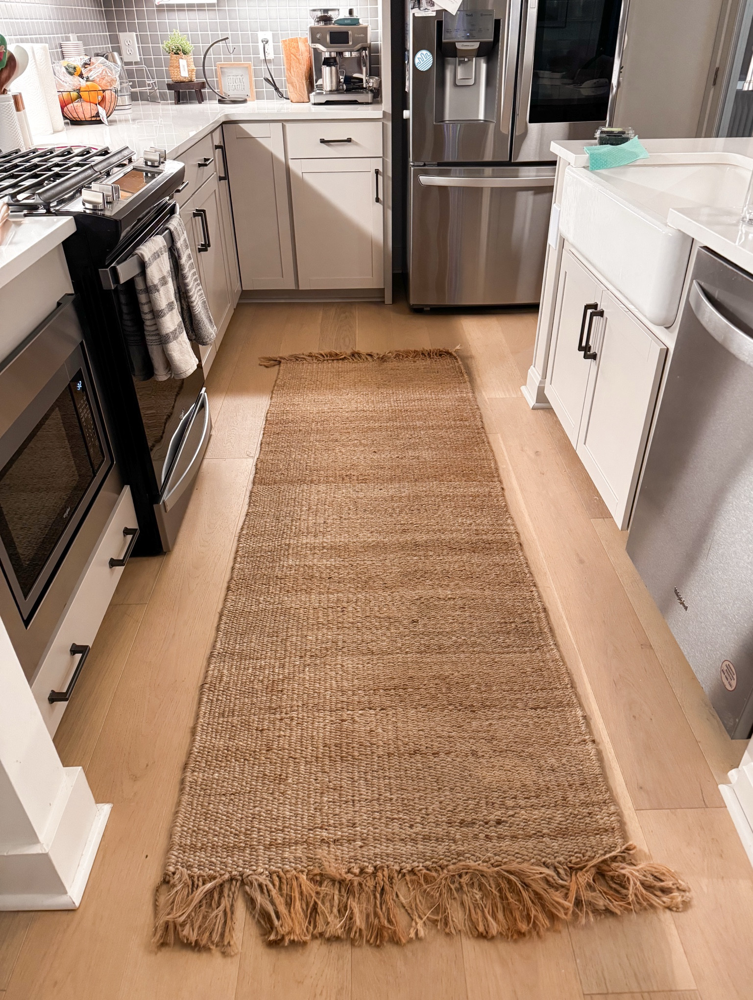 I am loving this jute rug as my new kitchen runner! If you’ve been around for a bit, you know I had a jute rug in my old kitchen and absolutely loved it. The Target version was too short for this kitchen but Boutique Rugs had the perfect fit! Its gives a California Casual / California Coastal look. 

Home decor, home on a budget 




#LTKStyleTip #LTKFindsUnder100 #LTKHome