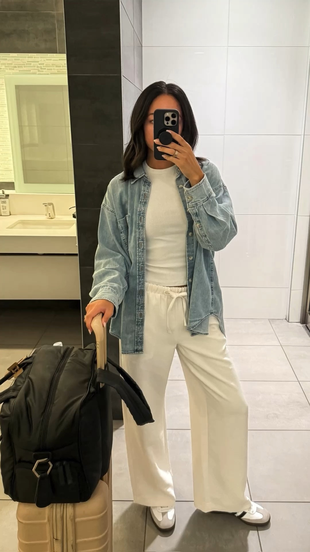 Ways that I've worn the viral Aritzia Denim Shirt 🖤 Such a great layering piece, made with a soft denim material and fits oversized! Wearing size S and color: 7 Yrs Pctr Ths Bleu 

White tee - size S
White pants - size S (wrinkle-free!)
White tank - size S
Black trousers - size 28 (similars linked) 
Jeans - size 26 XLong (pre-pregnancy size)
Knit shorts - size S (similars linked) 
Long sleeve jumpsuit  - size S (similars linked) 
Sleeveless jumpsuit - size S 

mom outfit, postpartum outfit, summer outift, summer fashion, summer style, denim shirt, travel outfit, airport outfit, work from home outfit, errands outfit, casual dinner outfit

#LTKSeasonal #LTKTravel