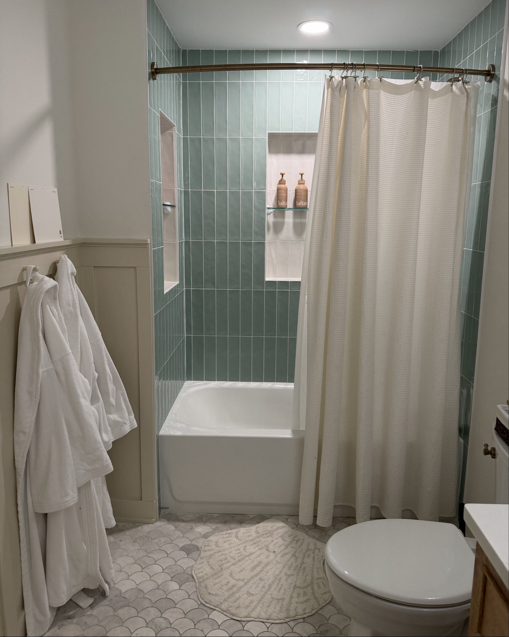 Guest bathroom refresh 🐚🤍✨
kept this space simple, clean, and a little beachy for guests

Added a fresh shower curtain, stocked it with matching shampoos + conditioners (because the little details matter), and the shell bath mat is my favorite touch.. it makes the whole space feel more elevated but still fun

everything is ready for guests to feel like they’re in a mini hotel moment 🫧🛁
linked everything here 🏡✨

#LTKHome
