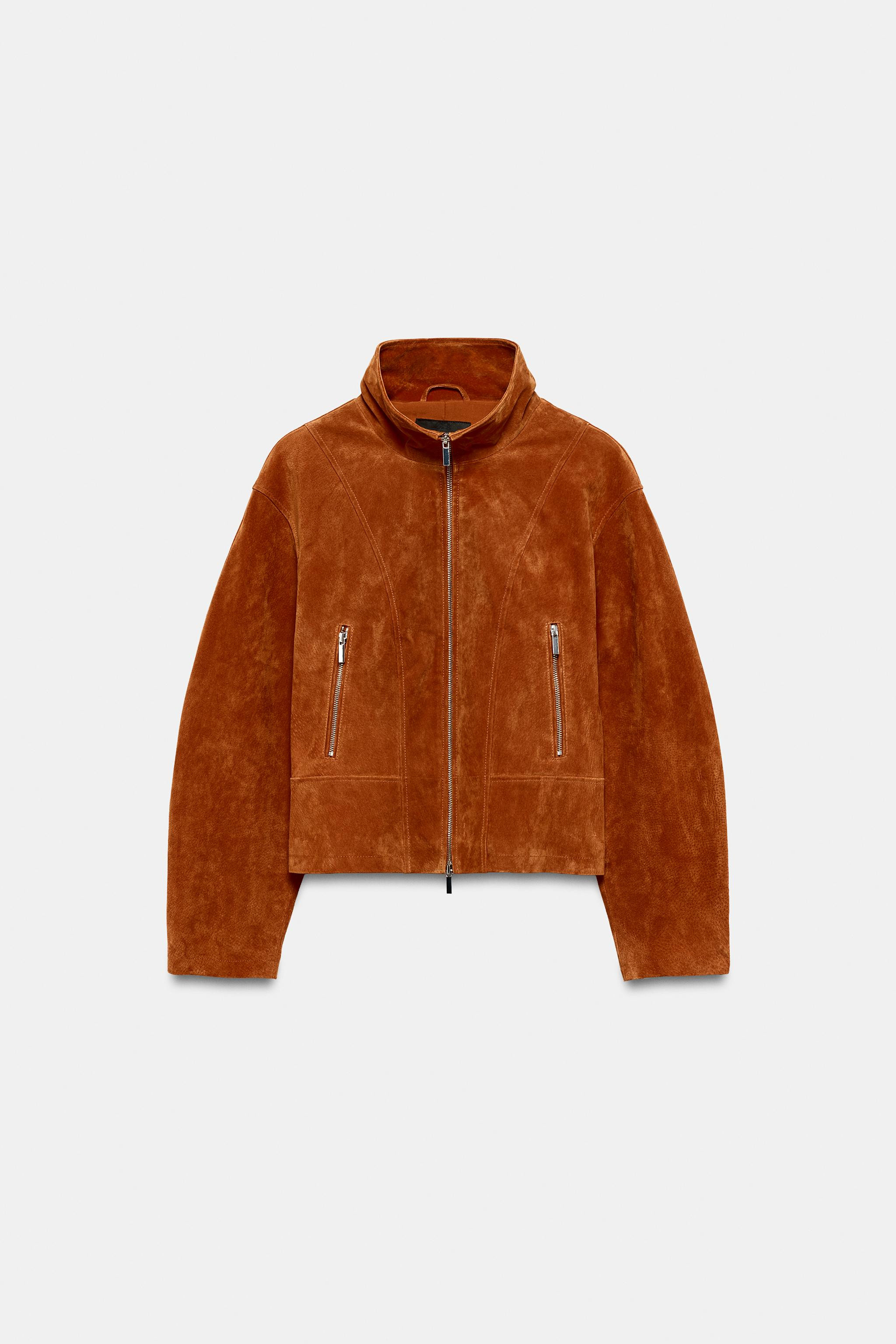Jacket crafted from 100% leather. Featuring a high collar, long sleeves, front zip pockets and me... | Zara UK