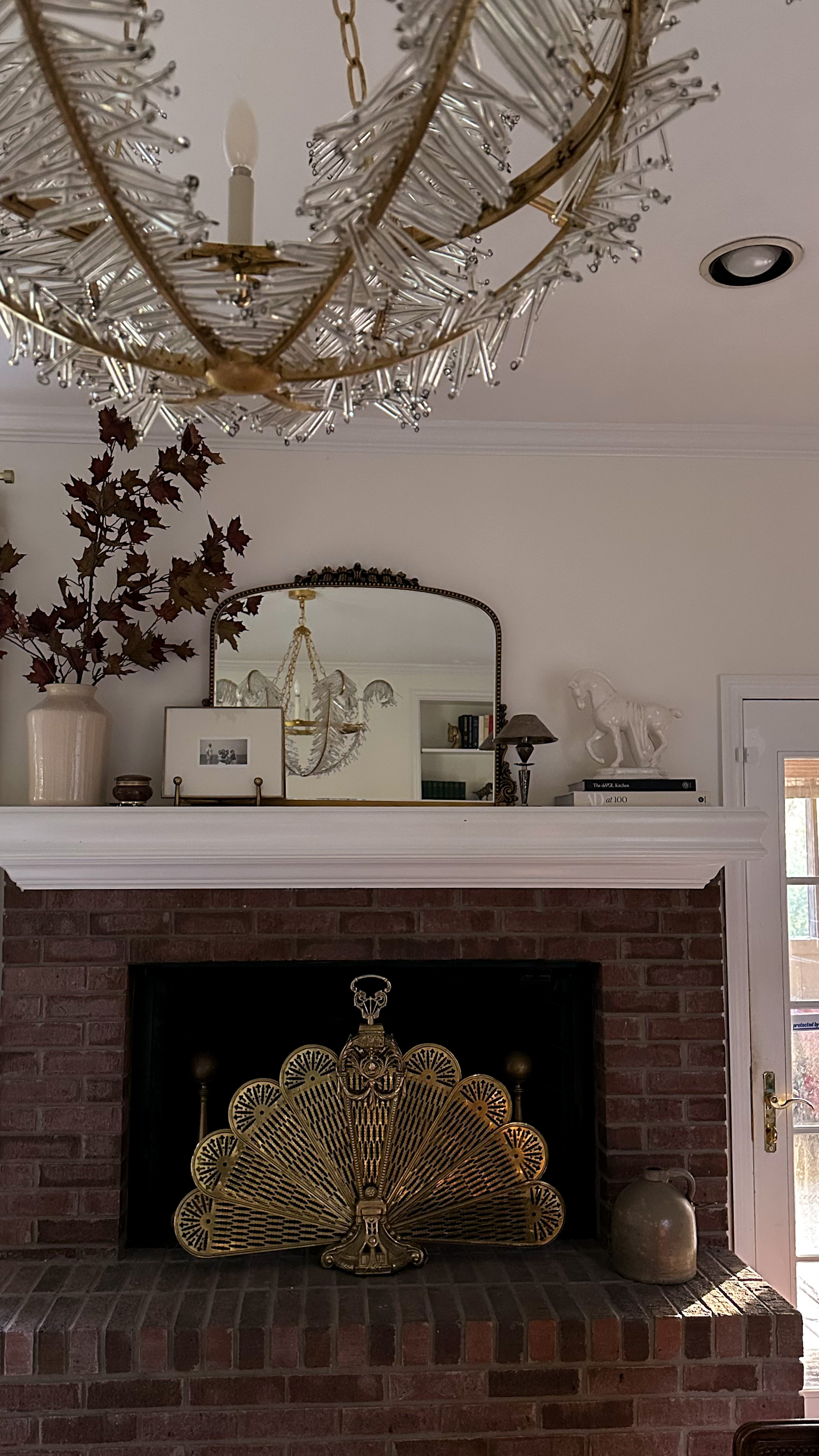 Some changes to my living room decor include a sneak peek of the new Calais Chandelier I just hung! I still can't believe I found this on FBMP. I'm thinking of swapping out the mirror above the fireplace for some artwork like what I have tagged here. My fireplace mantel styling ideas are always evolving and it's fun to mix things up! #livingroom #livingroomdecor #mantelstyling #fireplaceideas #interiordesign #luxurylighting  

 #LTKHome #LTKStyleTip