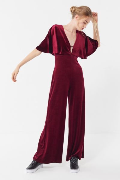 UO Velvet Flutter Sleeve Jumpsuit - Red XS at Urban Outfitters | Urban Outfitters (US and RoW)