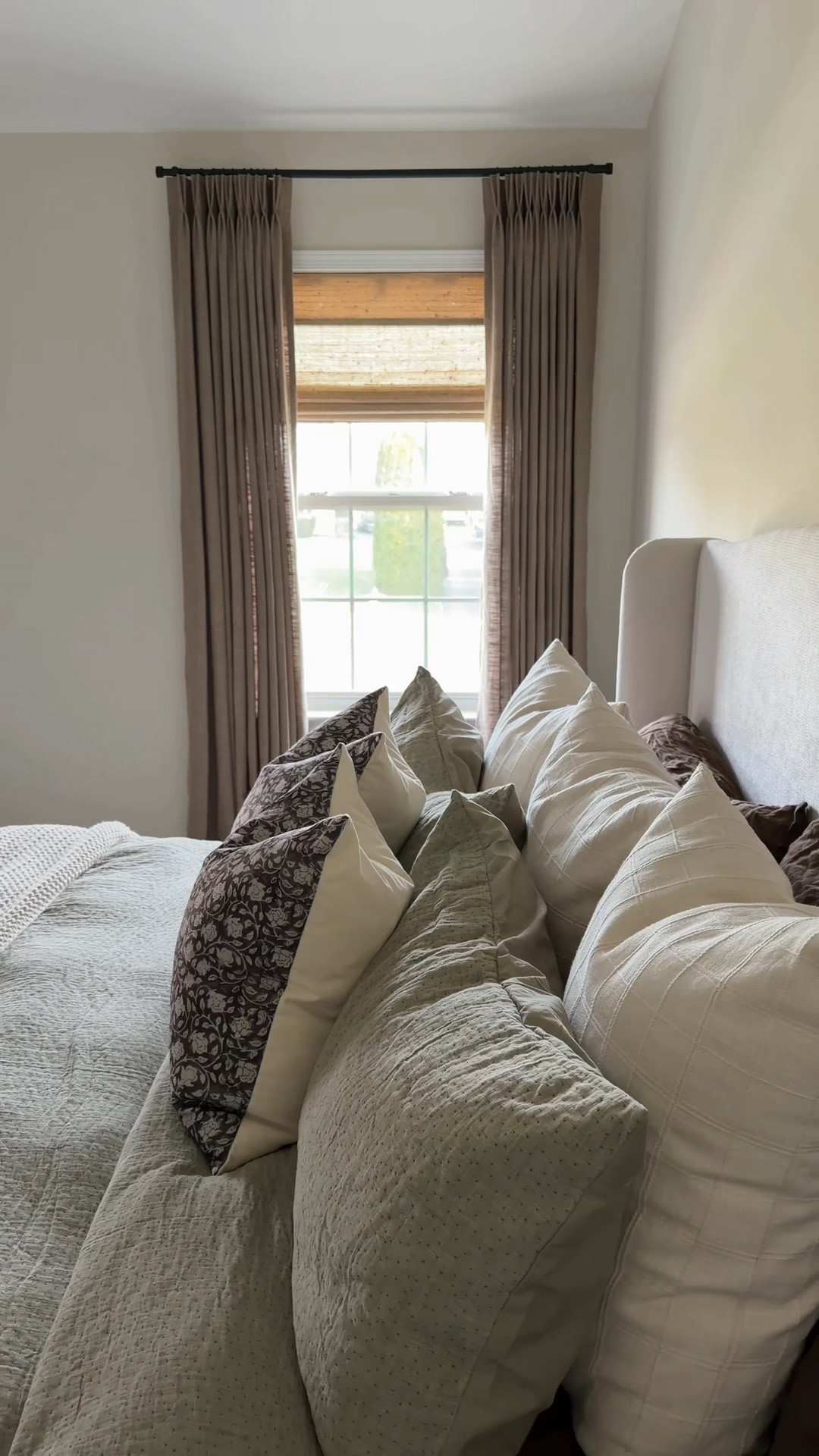 Still in the process of this bedroom makeover, but wow these curtains from @TWOPAGES really makes a statement 🤎 check out their glow up challenge happening now!! Love the quality of these curtains & bamboo shades so much and I am so excited to have them in this space. #bedroommakeover #bedroomdecor #neutralhome #twopagesglowup #twopageschallenge 