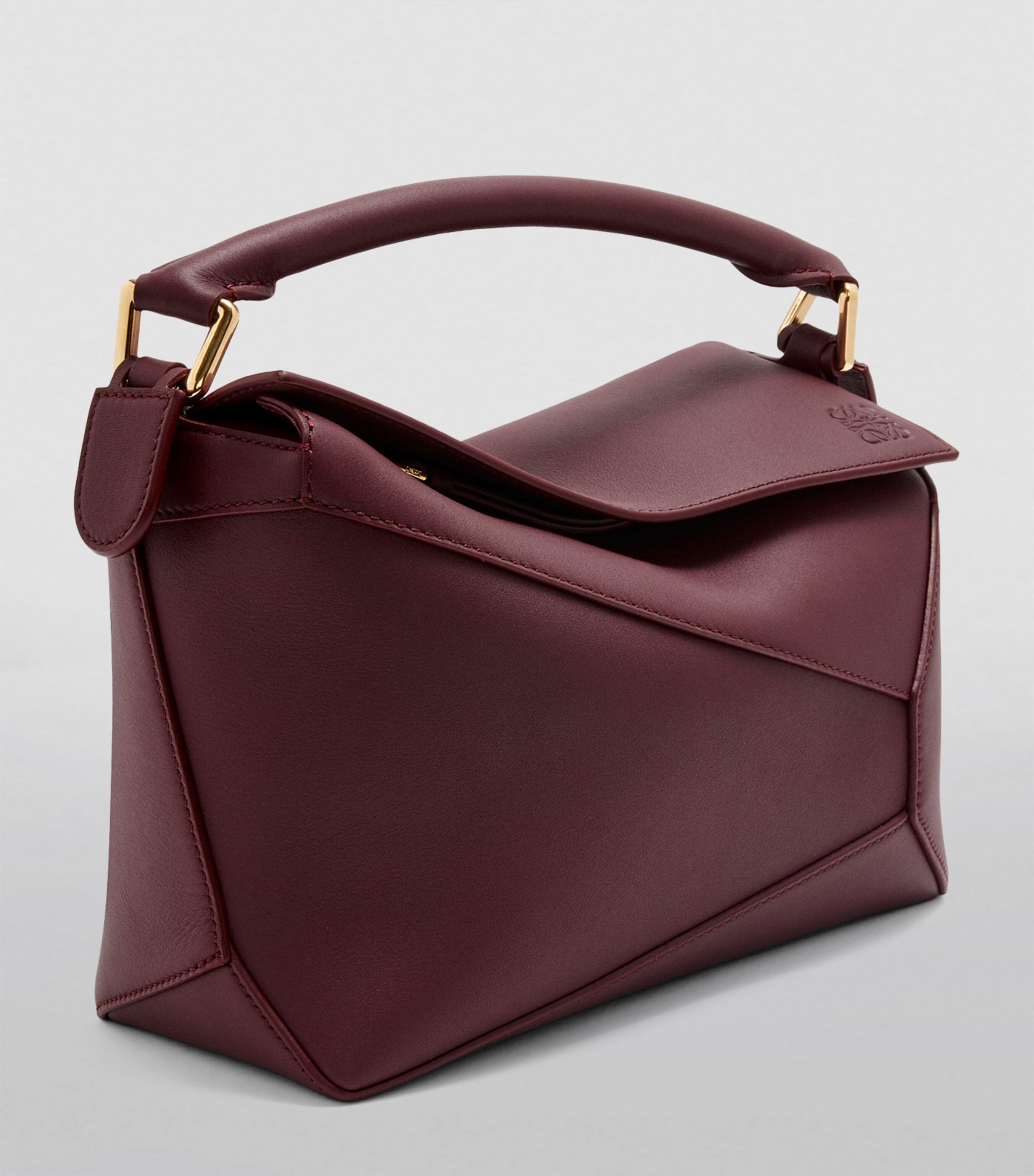 Small Leather Puzzle Edge Top-Handle Bag | Harrods