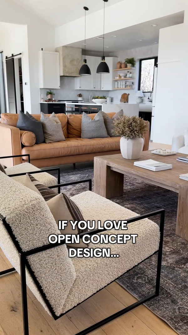 Our open-concept living room is designed to feel warm, inviting, and perfectly…