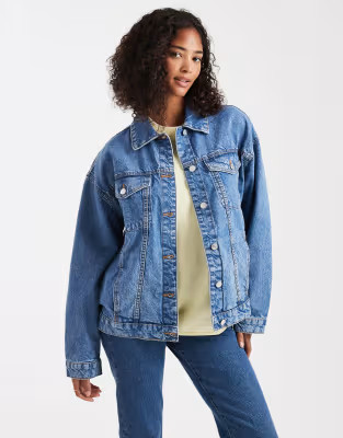 ASOS DESIGN oversize 90s denim jacket in midwash blue | ASOS (Global)