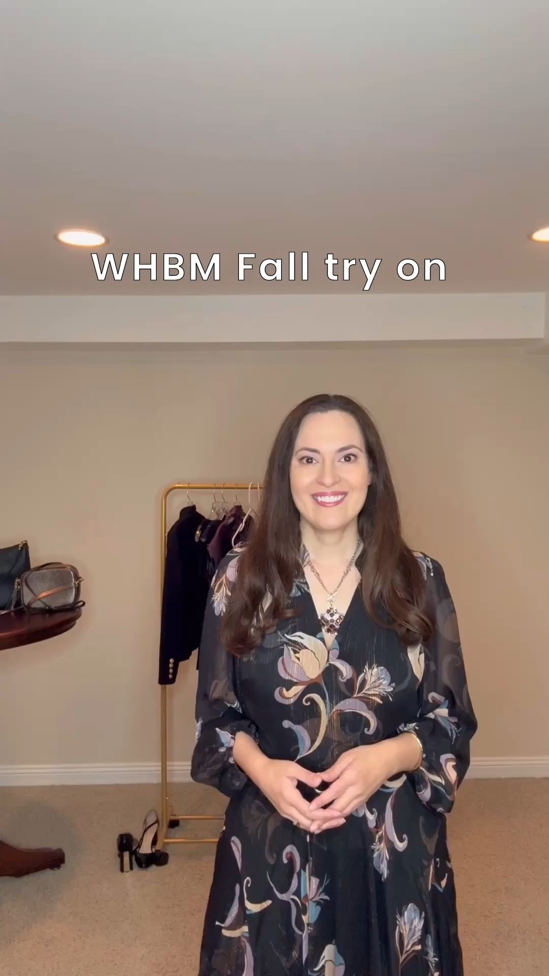 Trying on the latest looks from WHBM’s Fall collection. These versatile pieces will take you from Fall right into the Holiday season. The black chiffon midi dress is so pretty. It has a bit of gold lurex threading which gives the dress a little sparkle. The same print is also available in tops like the v-neck satin cap sleeve one in the video. The top is a little short so it looks better out than tucked in. Wearing size 4 in the dress and a small in the top. The black pants have some stretch. The purple satin top is a beautiful blouse. You can pair it with pants or jeans. Wear it with a skirt and statement jewelry and you have a cute Holiday outfit. The mid rise flare jeans are a nice wardrobe staple and fit nicely. The black ponte v-neck zip sleeveless top is fitted - perfect to wear with jeans or pants. It also makes a great layering piece under a blazer because it’s not too bulky  A great fitting tailored blazer / jacket is a must for Fall. The black jacket I’m wearing is a ponte material and has gold buttons. It looks amazing over tops, blouses and dresses. I’ll be wearing it often. It’s kind of that added piece that just makes your outfit look really put together. 