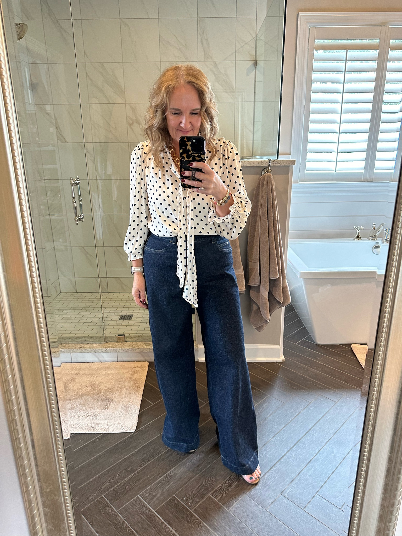 These jeans are from this winter before I lost some weight. So they are a size XL petite, I really need the large petite. In general, I order my larger size in Spanx jeans. Your regular size would fit, but I am preferring to not wear the clothes as tight.
Through September 30, 25% off your spanx order of $150 or more with code VIP25
After tonight, you can use my code NANETTEXSPANX for 15% off in free shipping any order. 

Blouse I am wearing a size medium. I love the polkadots! On its own or layered under a jacket or sweater.  

Fall outfit, office outfit, business, casual polkadot blouse, Kohl’s blouse, Spanx jeans, wide leg jeans, dark wash jeans

#LTKOver40 #LTKMidsize #LTKWorkwear