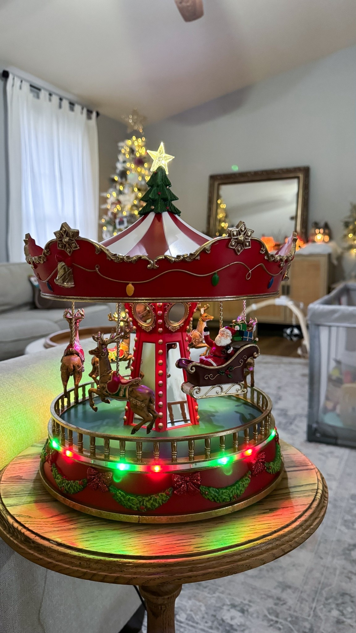 Santa carousel with music & lights! The price is so good for this! 

#LTKHoliday #LTKSeasonal #LTKCyberWeek