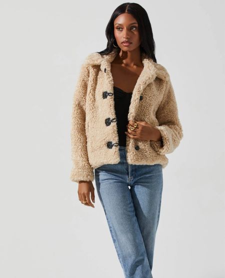 Faux Sherpa jacket. 
Natural color faux Sherpa
Notched collar
Statement loop buttons
Side pockets. 
kimbentley, fall outfit, winter coat,


#LTKover40 #LTKstyletip #LTKSeasonal