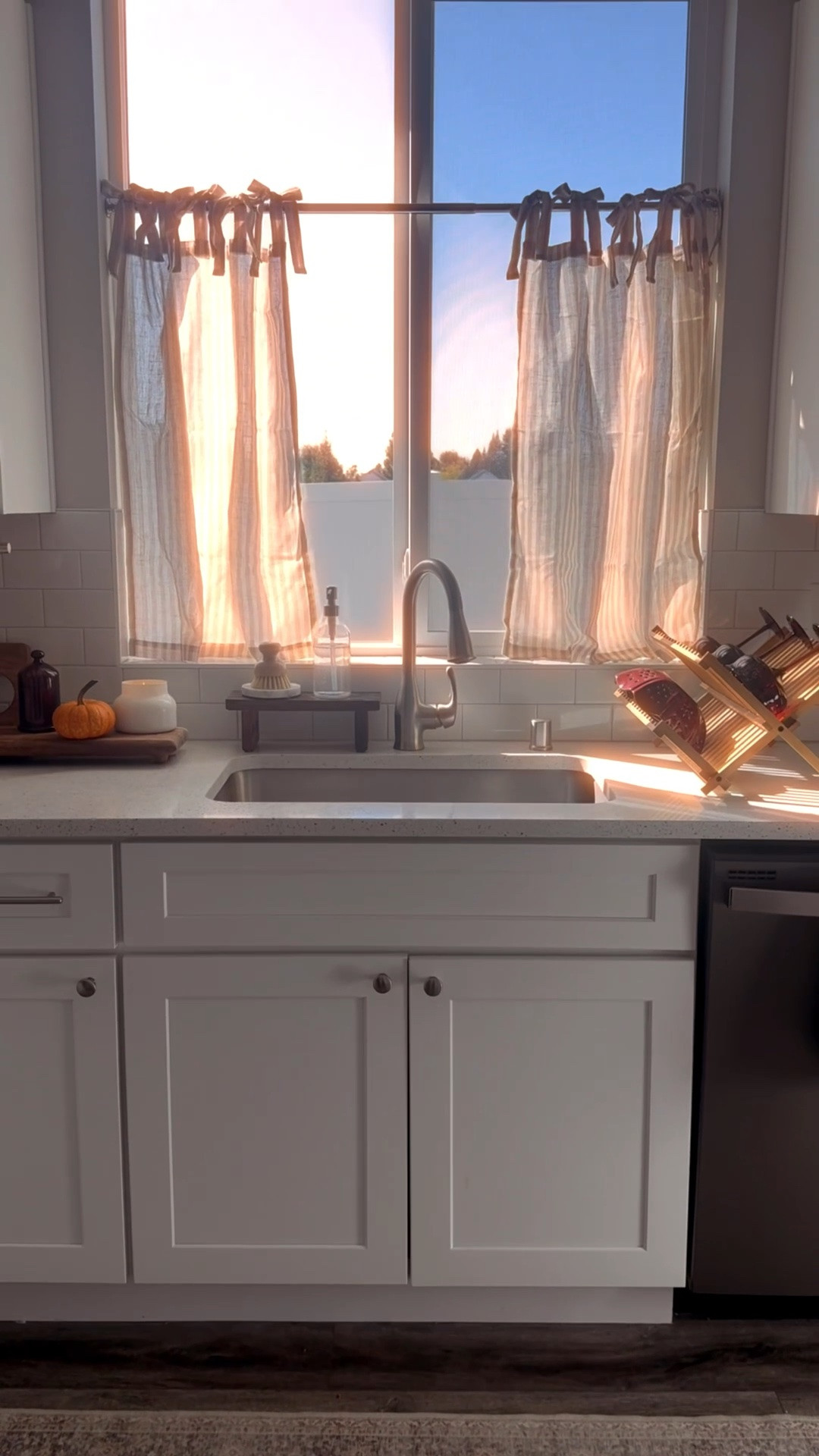 All I need is a new pendant light, and this kitchen sink will be feeling so cozy for fall! I love layering cozy elements with earthy autumn colors and textures. 🍂

This space is full of super budget friendly finds so be sure to comment “kitchen” if you want the details! 🤎

*the only item that isn’t exact is the wine bottle stand but I linked a very similar one* 
#autumndecor #kitchendecor #cozykitchen #fallhomedecor

#LTKHome