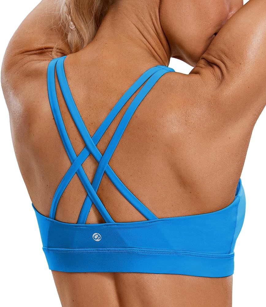 CRZ YOGA Women's Strappy Sports Bras Fitness Workout Padded Yoga Bra Criss Cross Back | Amazon (US)