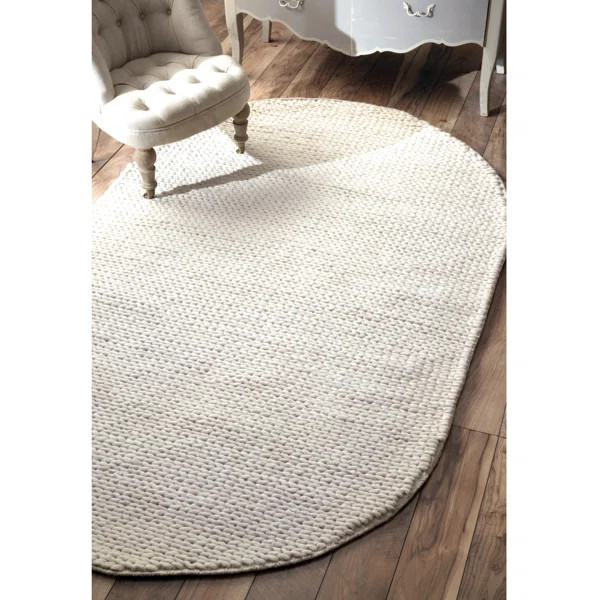 Dunanney Handmade Braided Area Rug in Ivory | Wayfair North America