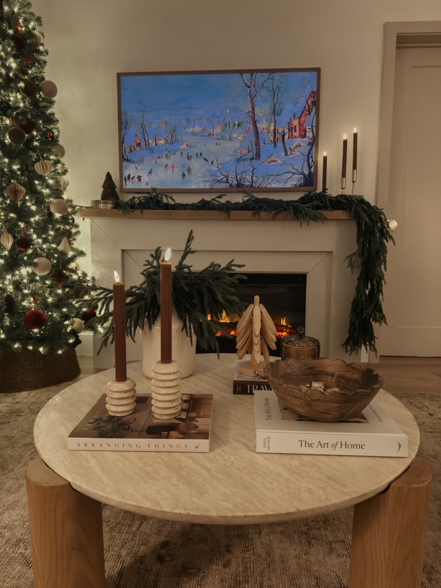 Cozy holiday styling with a few of my Amazon staples that are on sale for Cyber Monday! 🤎🎄

The Google Canvas TV, travertine candleholders, Christmas tree coasters, and The Art of Home book. 

@amazon #ad #founditonamazon #winterfavorites2025 

Neutral home. Holiday decor. Christmas decor.  Home decor. Coffee table styling. Living room decor  

#LTKCyberWeek #LTKHome #LTKHoliday