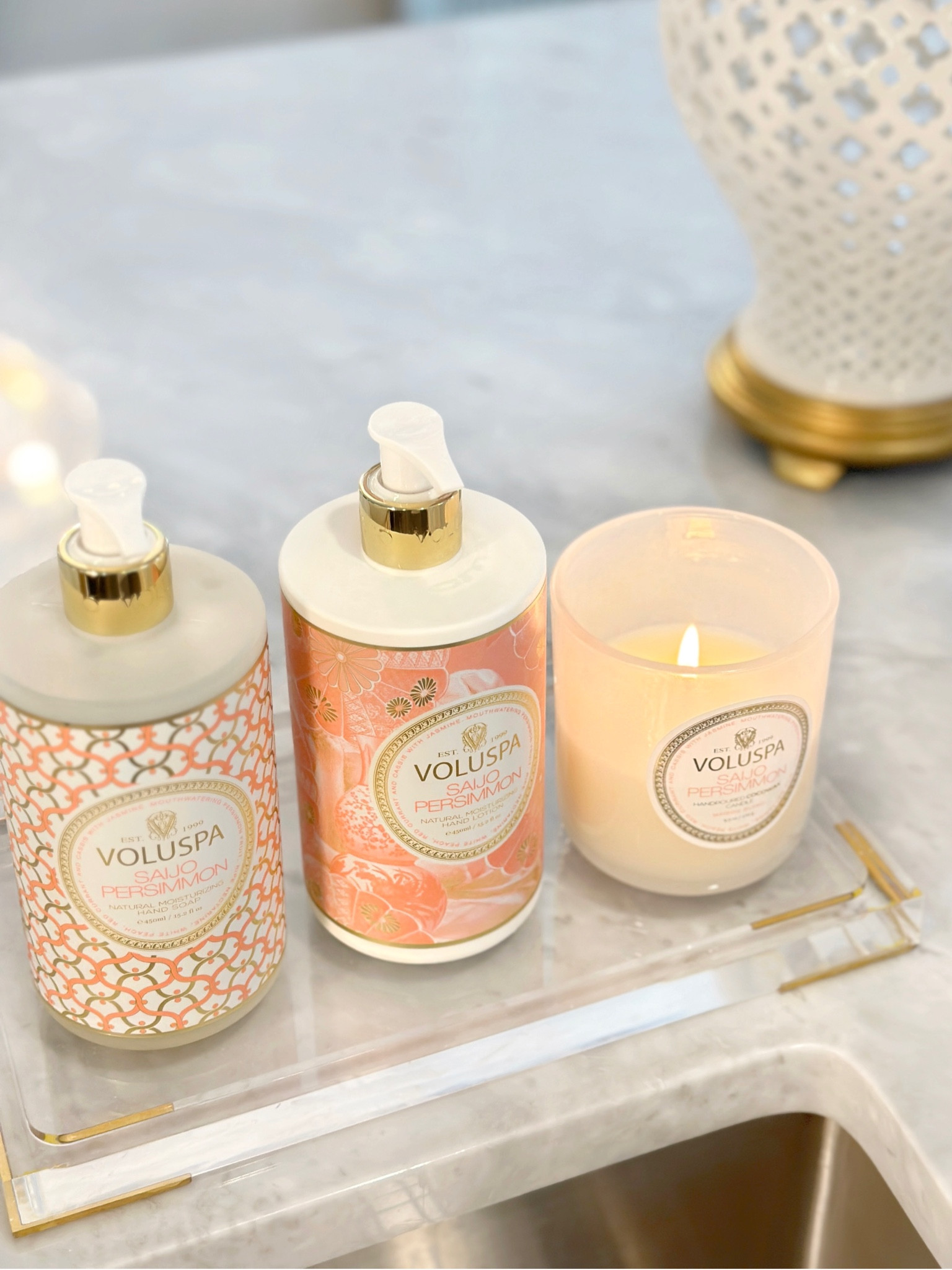 Spring kitchen sink styling, soap and lotion set, voluspa candles acrylic tray lucite tray 

#LTKhome #LTKsalealert #LTKunder50