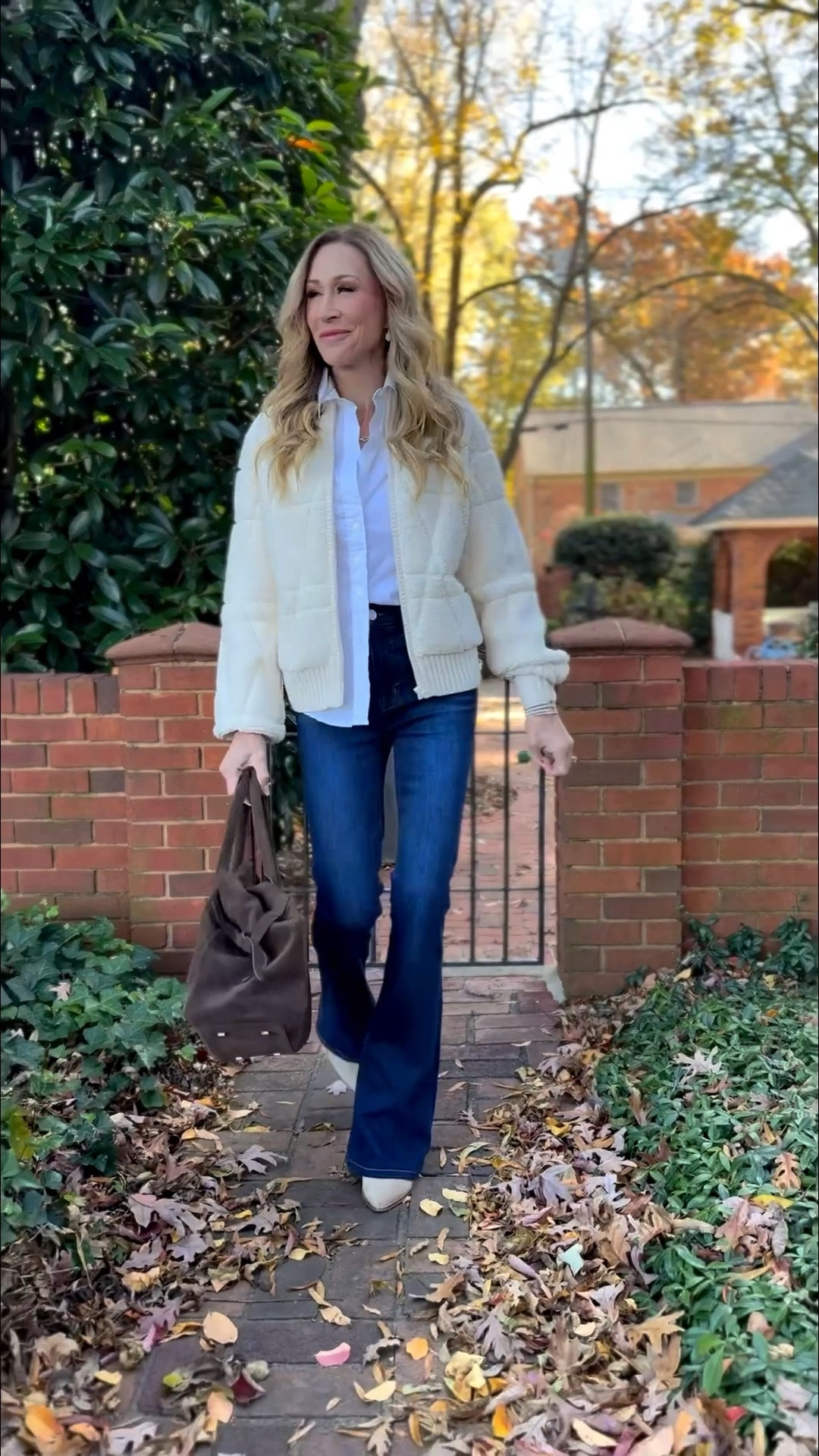 Dressed head to toe in Brochu Walker!  These versatile pieces can be endlessly mixed and matched to create outfits for fall and winter!  Brown suede bag, suede booties, fall outfit idea, white shirt, cream sweater bomber, dark wash flare jeans 


#LTKItBag #LTKSeasonal #LTKSwim