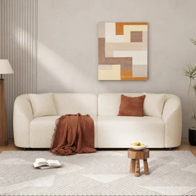 Curved Contemporary Sofa in Beige: Plush Seating, Streamlined Design, and Durable Frame – Ideal for Stylish Living Spaces | Wayfair North America