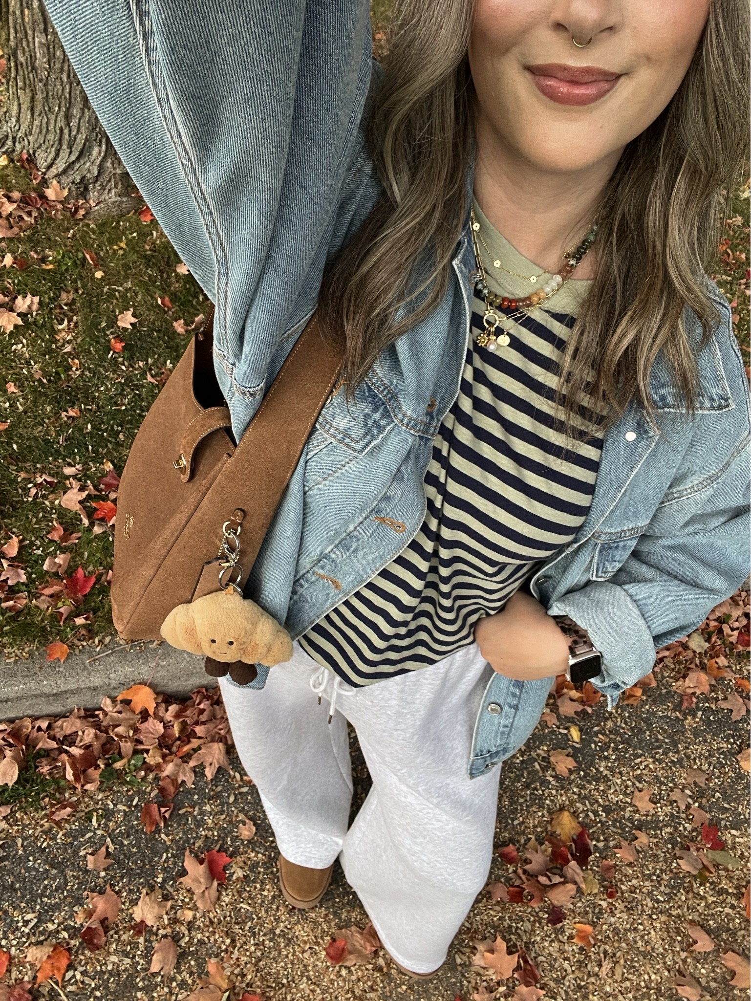 Comfy fall outfit! Wearing size L in the sweatpants and striped tee. Sized up to XL in the denim jacket for an oversized fit. I’m a 9.5-10 shoe and wear a 10 in the Uggs

#LTKfall #LTKsale #LTKstyletip