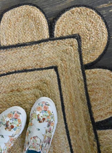 This scalloped jute rug with black trim is such a fun Spring refresh for our entryway!
It comes in a variety of different colored trims, too. It would be so cute for a porch, too! 
Trying to figure out where I could  put a green edged one:) 
They come in all sizes & shapes, even runner lengths. Great texture accent for your home!

#LTKhome #LTKFind #LTKSeasonal