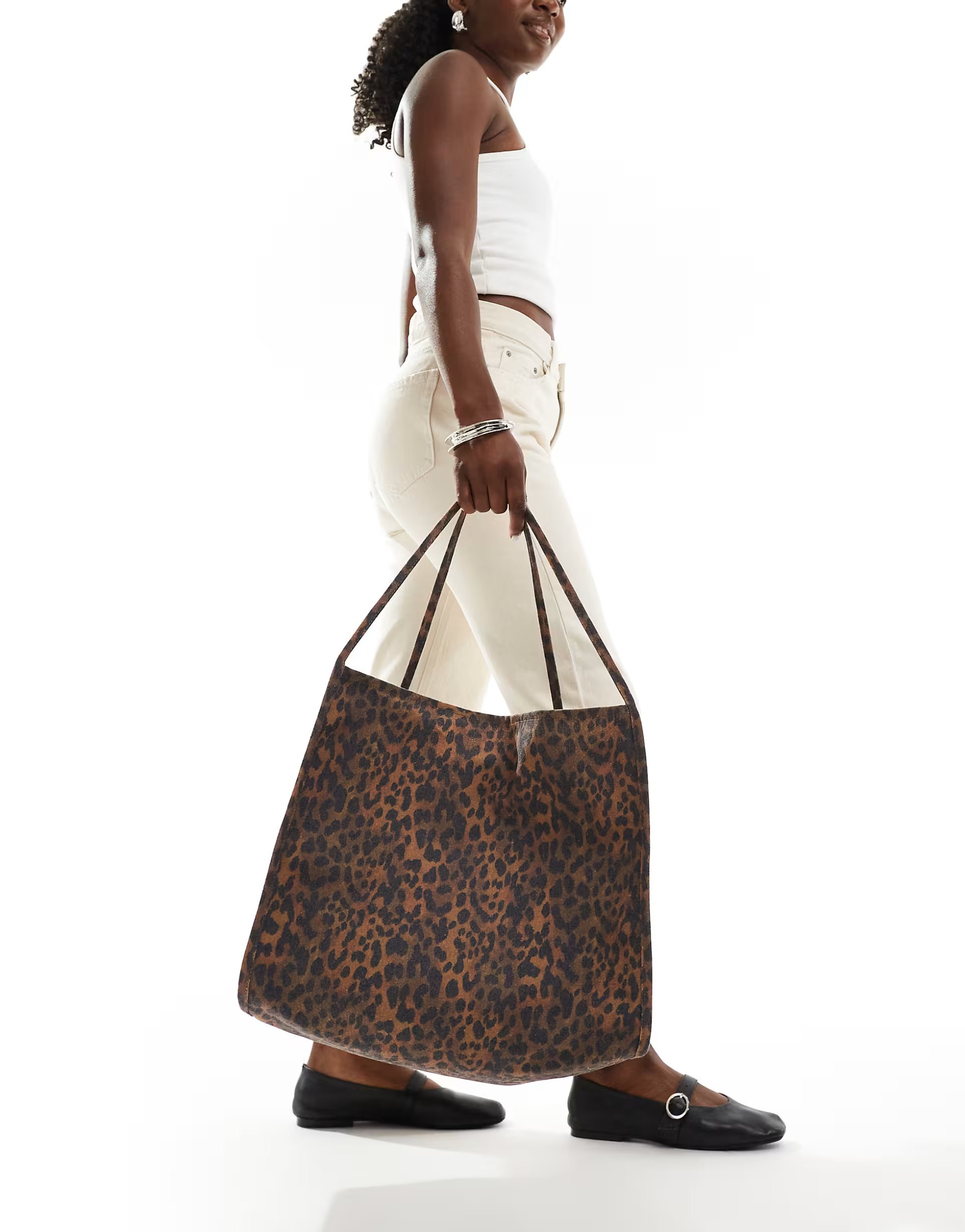 ASOS DESIGN tubular handle canvas tote bag in brown leopard | ASOS (Global)