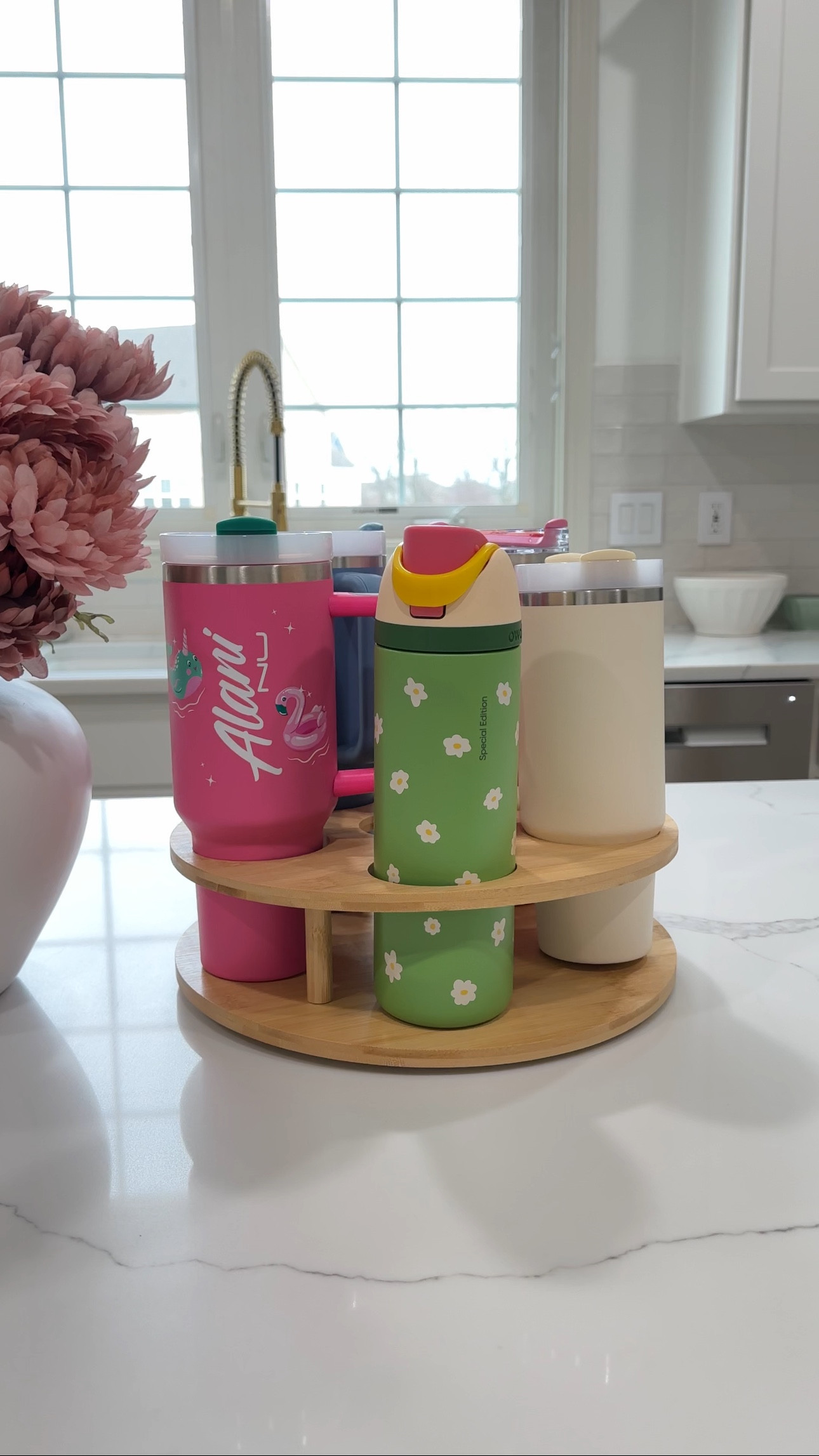 bottle organization! fits many types of bottles to keep your cabinet organized #kitchenorganization #stanley #organizedhome

#LTKHome