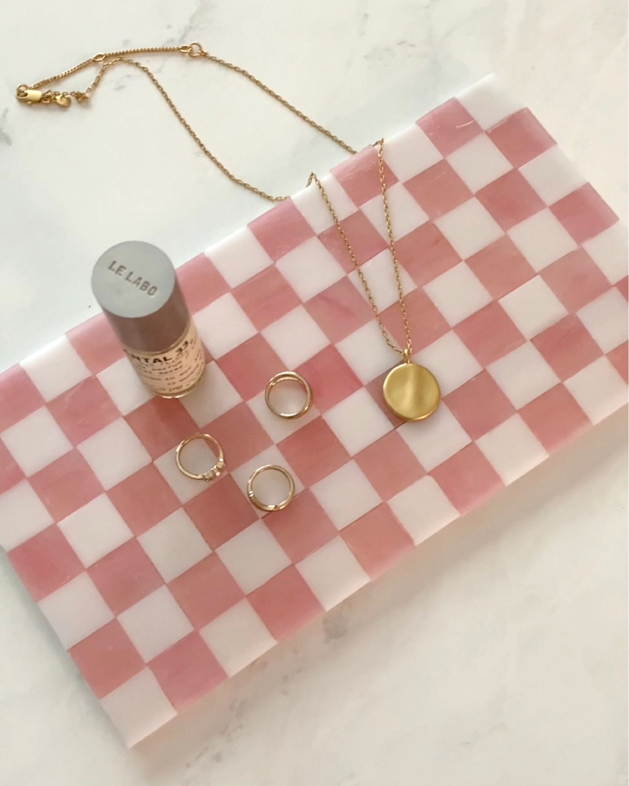 When I saw these glass tiles I immediately knew I had to make something with them! This vanity trinket tray is so simple, gorgeous and easy to create. 

#LTKFindsUnder50 #LTKSpringSale #LTKHome