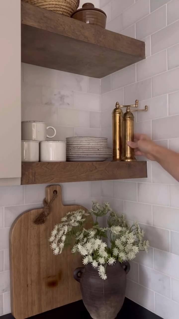 I’ve been using these for 3 years now and I couldn’t cook without them. Yes, I use them and don’t just display them 😂. They’ve aged with the most gorgeous patina and are so well made. Comment below and I’ll send you the link to these brass spice mills.

Timeless kitchen decor and accessories