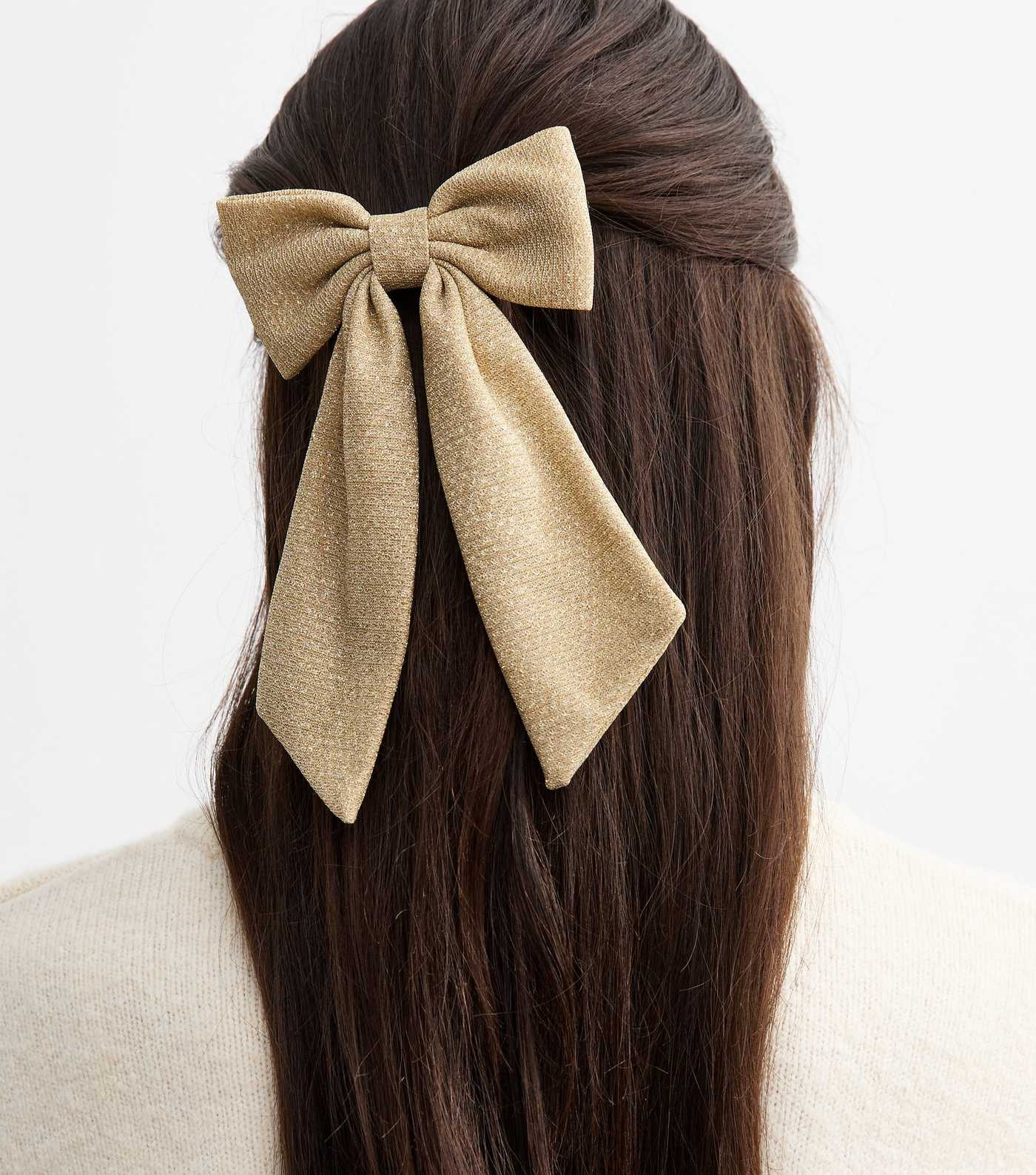 Gold Metallic Bow Hair Slide
						
						Add to Saved Items
						Remove from Saved Items | New Look (UK)