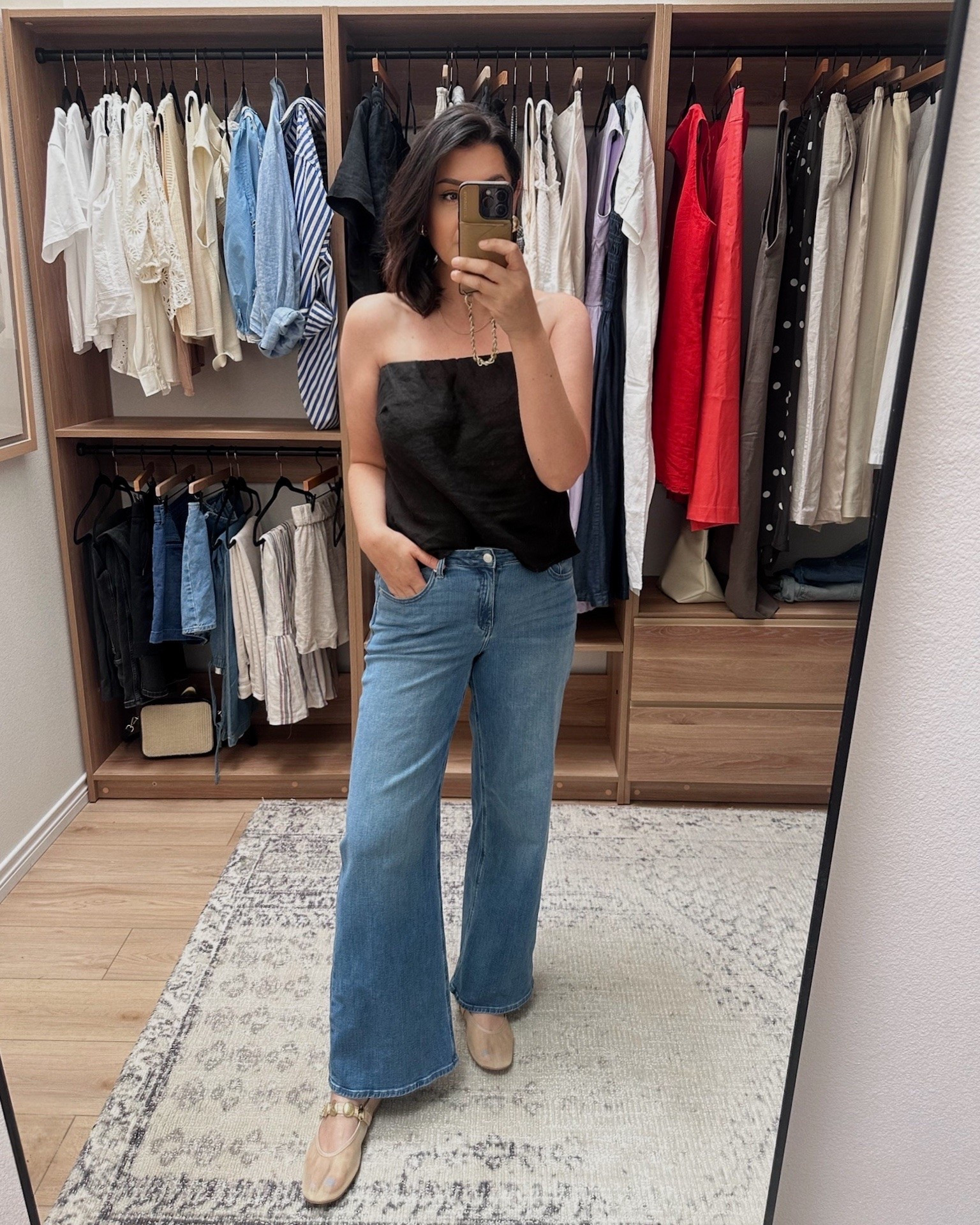 I’m in the large of the linen tube top, runs true to size! I’m in the 30 of the jeans, also tts. @Quince