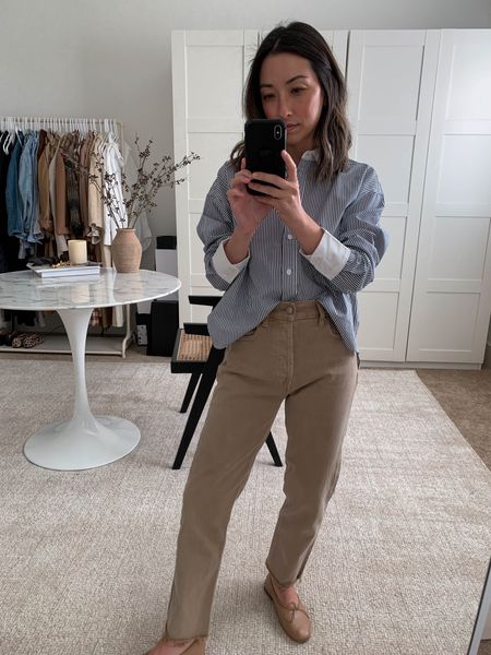 J.crew striped button down. Love this cropped shirt. Easy to tuck in. sized up to a 4 for more room. 

Shirt - J.crew 4
Jeans - Gap petite 26. Sized up 2 sizes. 
Flats - Mansur Gavriel 35