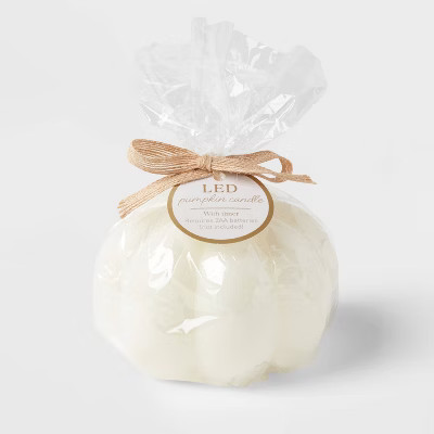 3.75" x 5" Pumpkin Dog Bone LED Candle Ivory - Threshold™ | Target