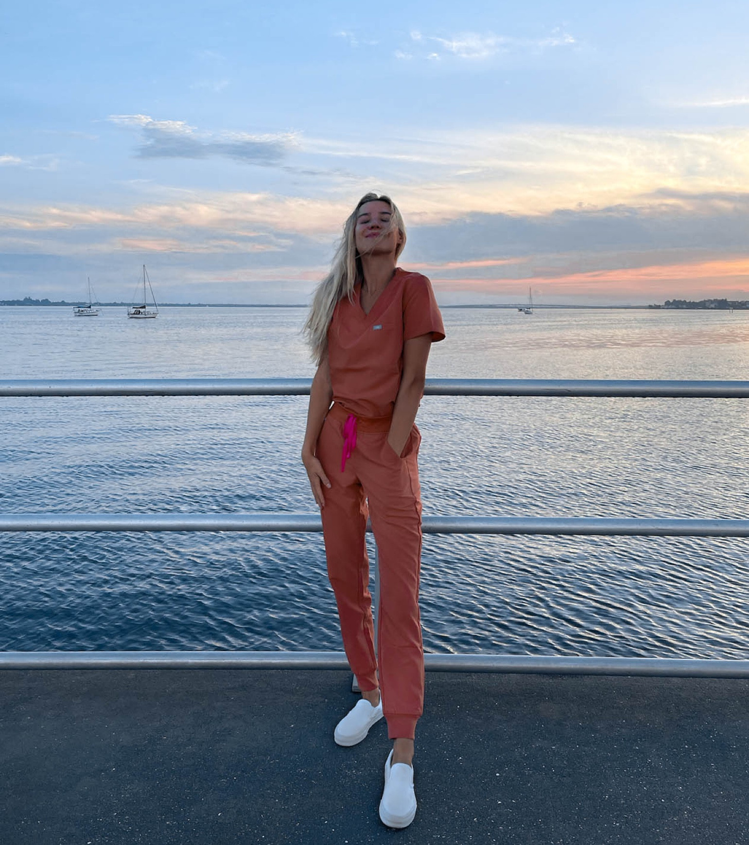 New FIGS Terracotta scrub set 
Top: linked 
Bottoms: linked 
Shoes: linked 

#LTKSeasonal #LTKworkwear #LTKSale