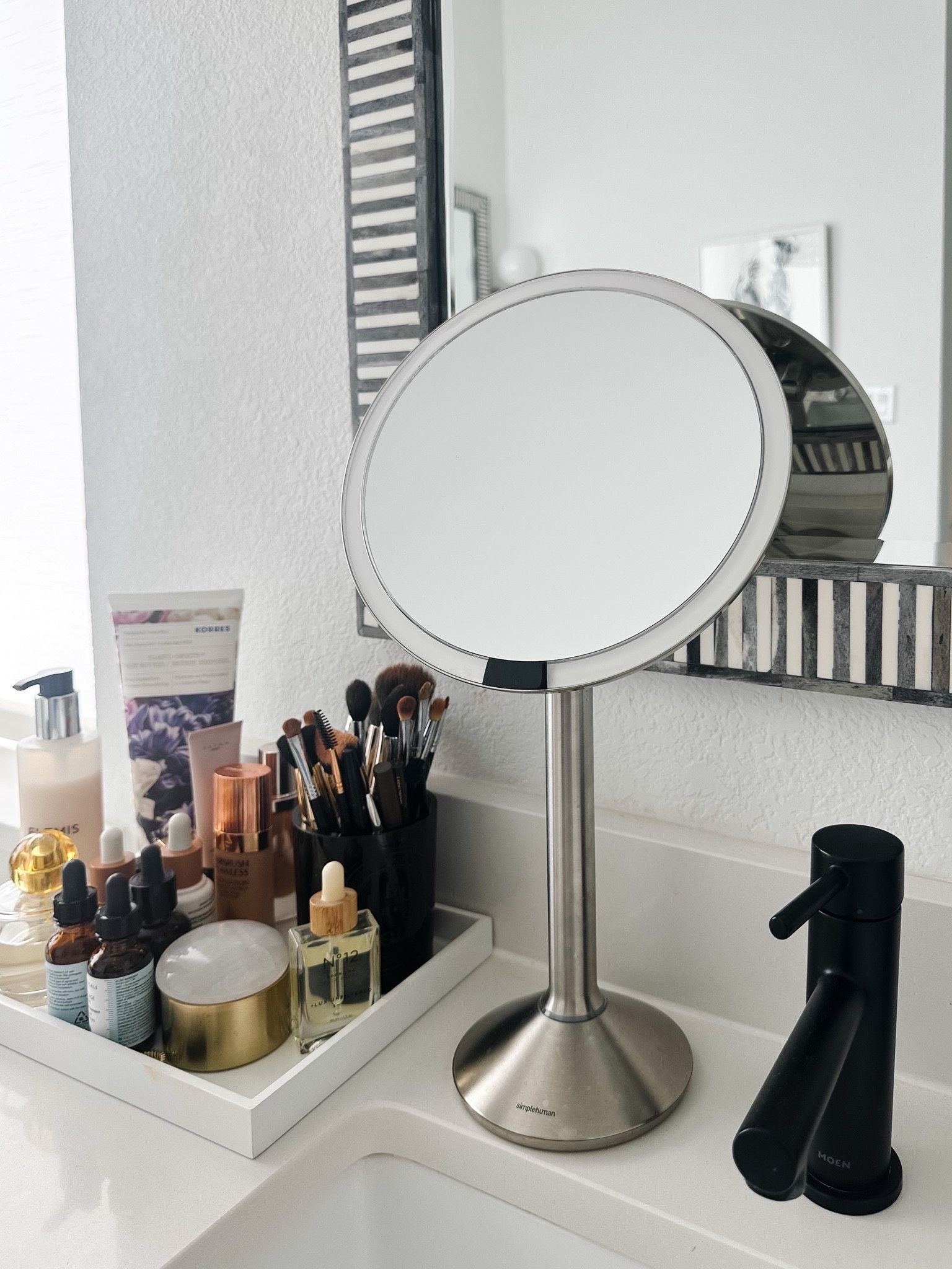 Absolutely love my simplehuman sensor mirror! Magnifies by 5x, lights up automatically when you approach and has different lighting settings. Part of the NSALE! 

#LTKBeauty #LTKxNSale #LTKSaleAlert