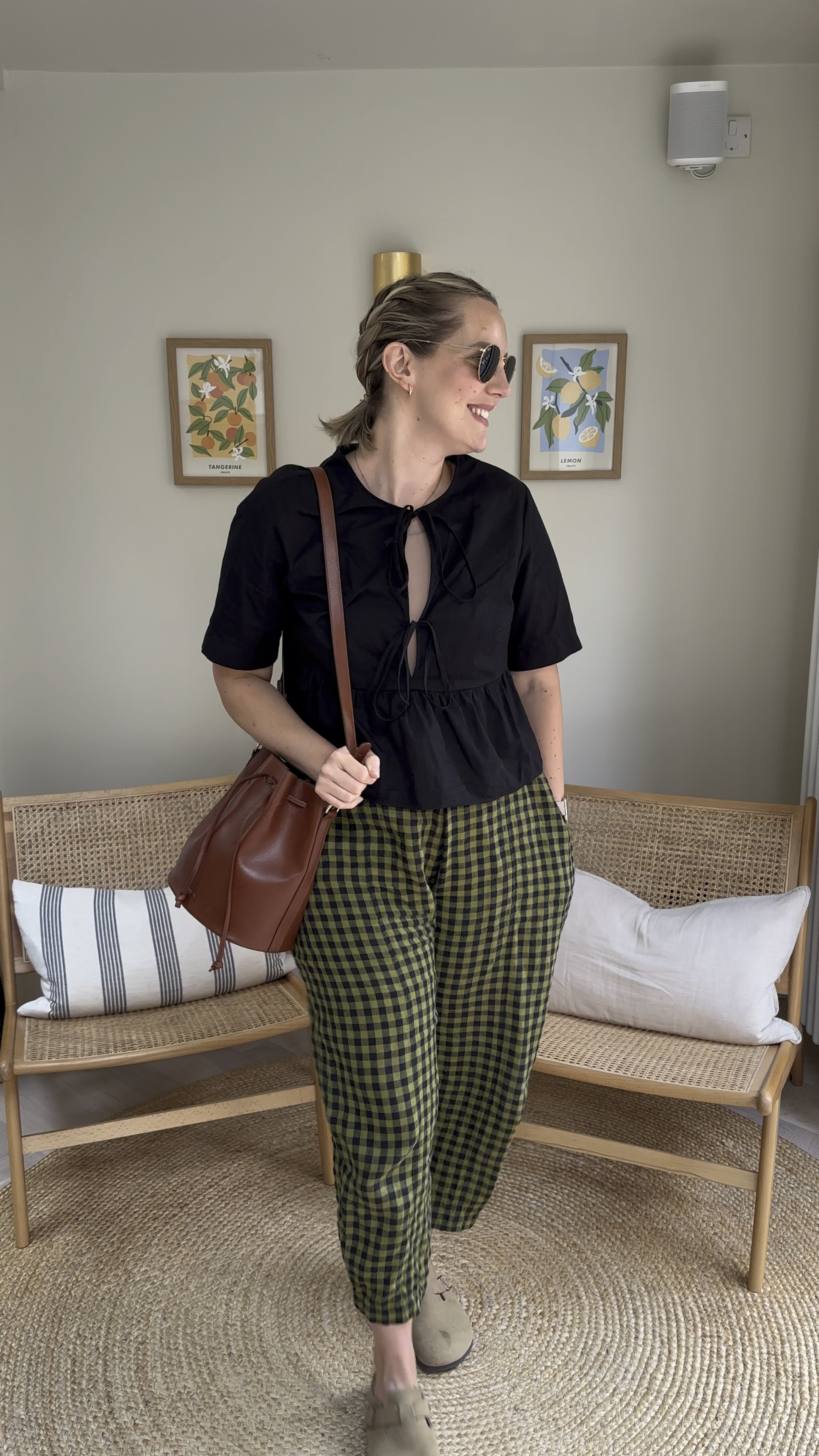 Fashion midsize work outfit, with colour and interest! I’ve got you.
Birkenstock sandals, Beyond Nine green check Mabel’s (size xs, alternatives linked) H&M tie front top (size M), Sezane bag and Rayban sunglasses. 

#LTKworkwear #LTKuk #LTKsummer