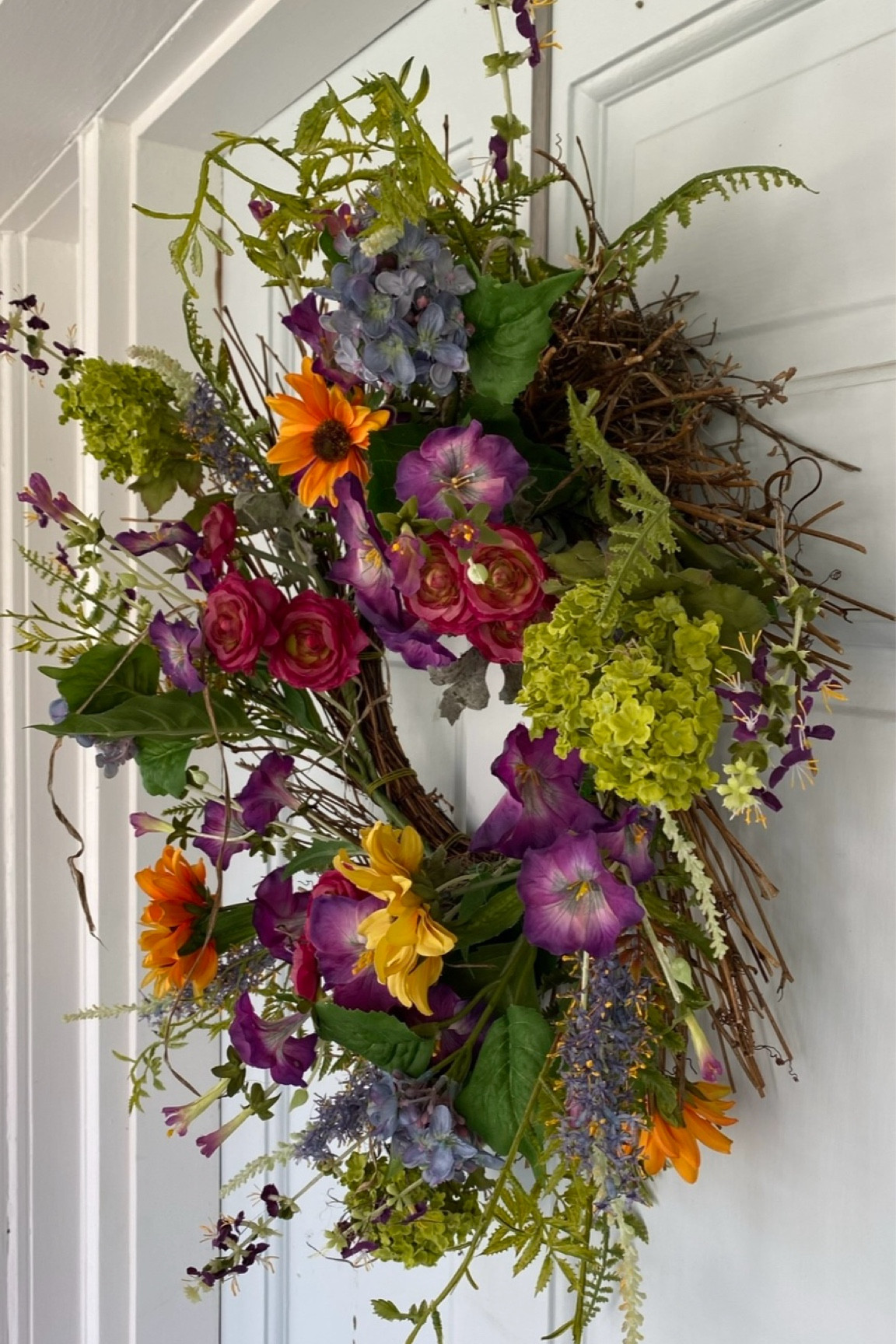 This wreath is GORG in real life & works for spring and summer. It's really pretty close up - also attracts birds so watch out for that 🫠

#LTKhome #LTKSeasonal