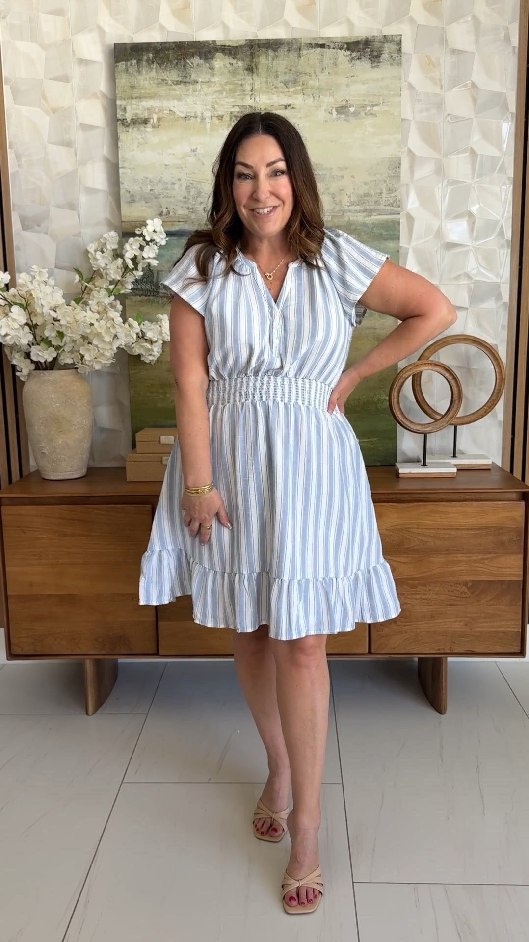 The sweetest little dress moment 💙 This striped mini dress is flattering, lightweight, and so easy to throw on and go. Love the smocked waist and flowy fit—perfect for spring and summer days when you want to feel put together with zero effort.

Sizing: true to size, L 

#LTKOver40 #LTKMidsize #LTKSeasonal
