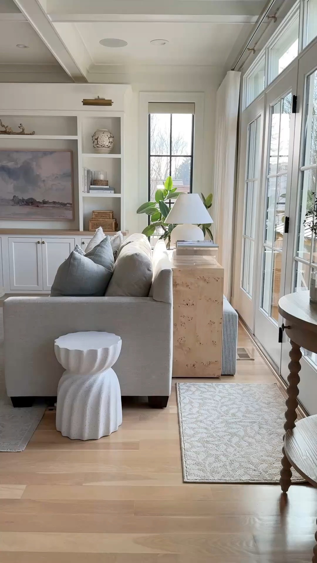 A room that feels both refined and lived in. Soft neutrals, natural textures, durable performance fabrics, and classic furniture create a cozy living room that’s beautiful enough for guests but practical enough for everyday family life. Everything I’m loving (including similar media cabinets) is linked.