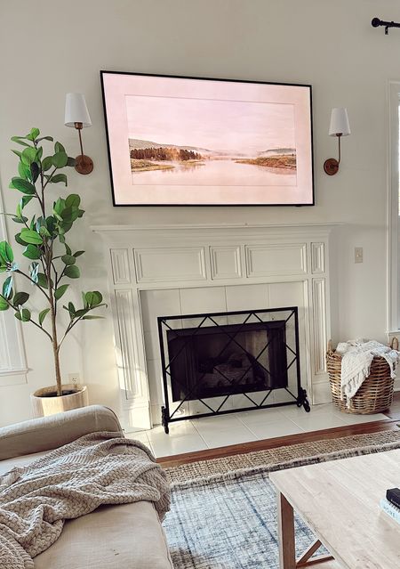 Spring living room decor // frame tv // faux plant // Target find @target #ltkunder50 #ltkunder100 

#LTKSeasonal #LTKhome #LTKFind