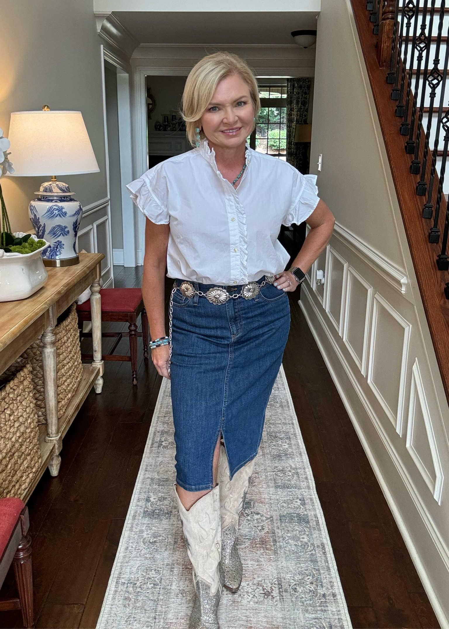 Finally joining in on the denim midi skirt trend. I've found a couple that are comfortable, AND not too long for my 5'2" frame. Classic white shirt has a feminine twist and Western inspired accessories keep it interesting. 
Wearing the blouse in Small, skirt in 4.  

Western outfit
Country concert outfit
Rodeo outfit
Rodeo glam
Country chic
Texas chic
Boots 
Petite

#LTKFindsUnder100 #LTKStyleTip #LTKOver40
