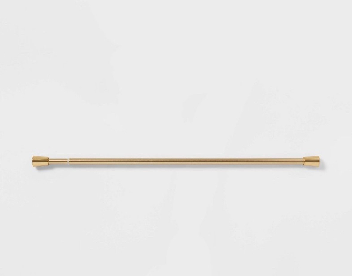 Brass shower curtain rod 