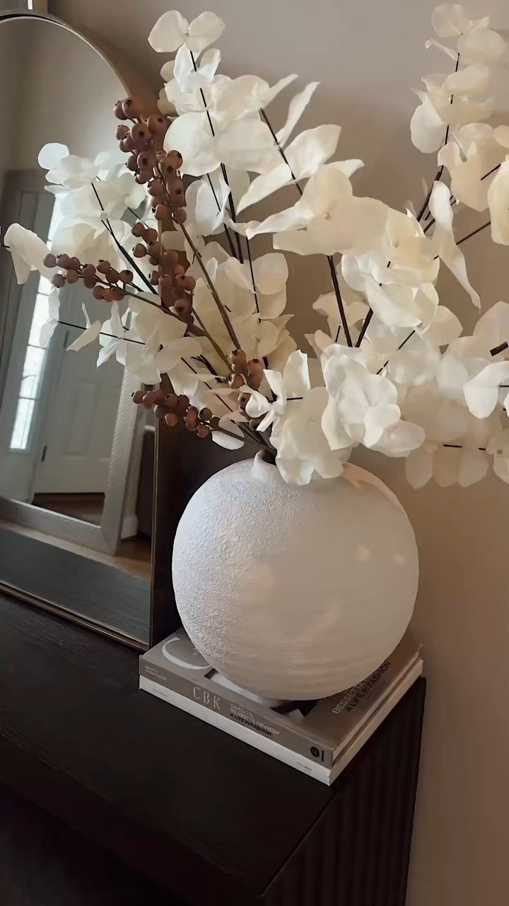 My foyer is fall ready! 🍂✨Cozy textures, warm tones, and just the right seasonal touches to make the entryway feel welcoming all season long. 

#FallDecor #HomeStyle #LTKHome #SeasonalDecor #FallReady #Foyer 

 