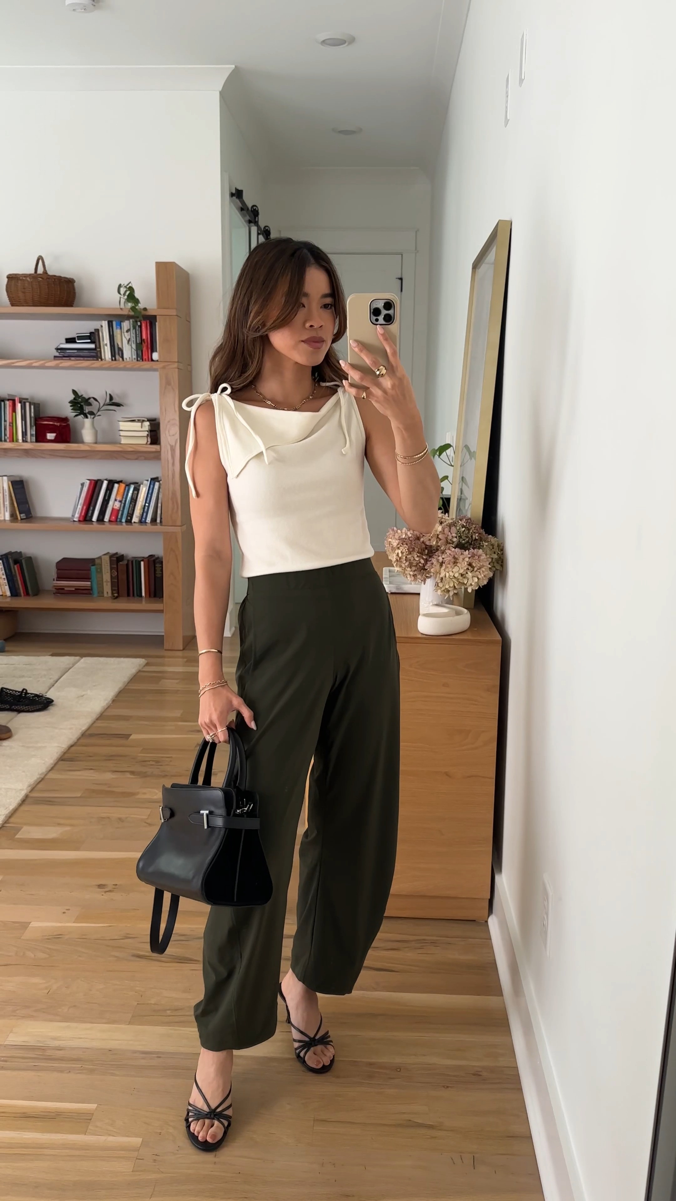 The comfiest pull on pant from @Ruti. I love how it comes in a short inseam for petites!

Sizing info: 
-Ruti The On The Loose Work Pants (Size 0 regular in Verdant) 
-Reformation Emma Knit Top (XS in Fior Di Latte)

green pants, petite pants, green petite pants, fall pants, summer pants, barrel pants, summer outfit, fall outfit, vacation outfit, travel outfit, best petite pants, petite barrel pants, comfy pants, viral barrel pants, fall style, petite fall style, fall top, heels, black heels

#LTKootd #LTKSeasonal #LTKPetite
