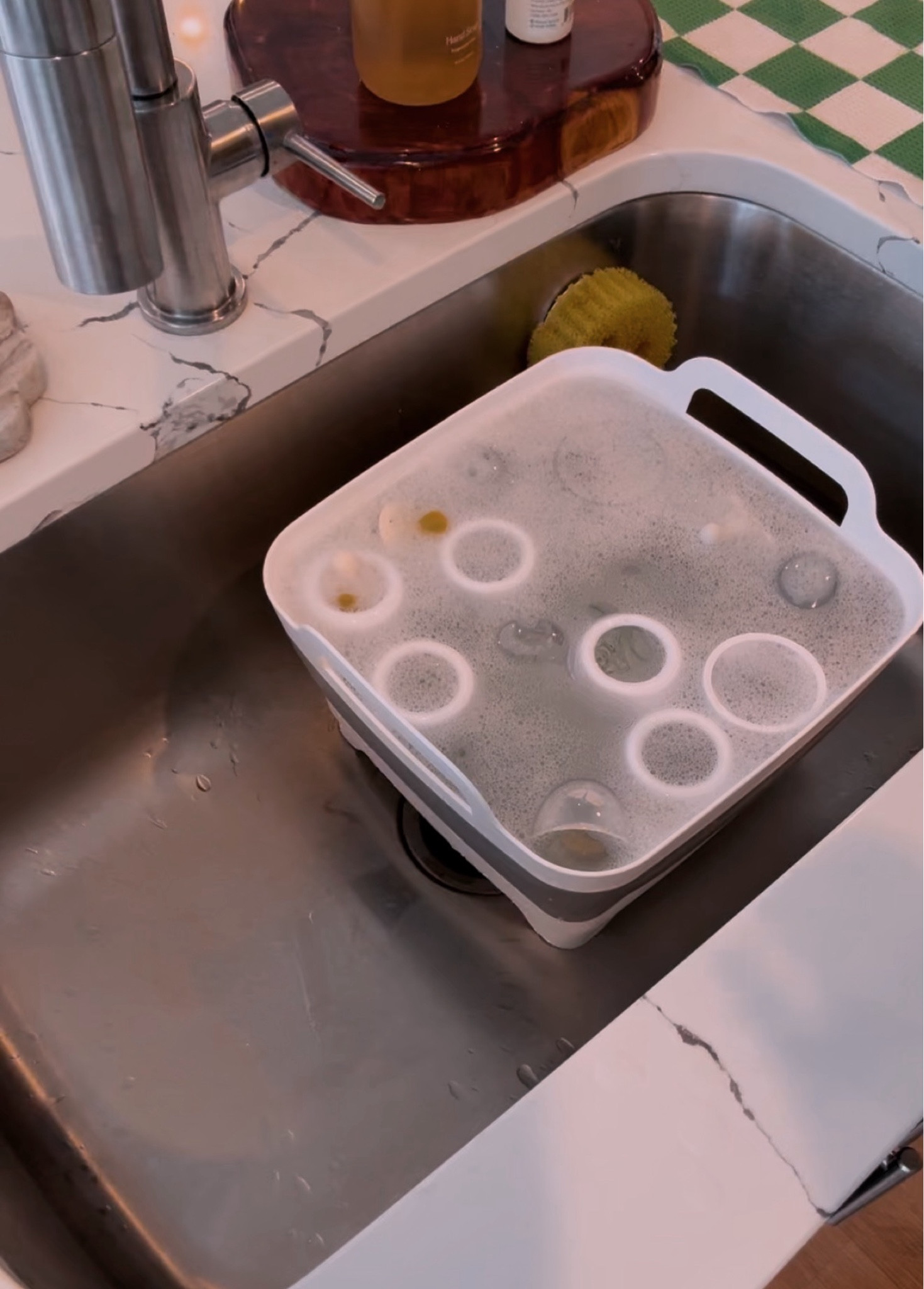 Collapsible bin makes it so easy to throw bottles in during the day to clean not

#LTKBaby