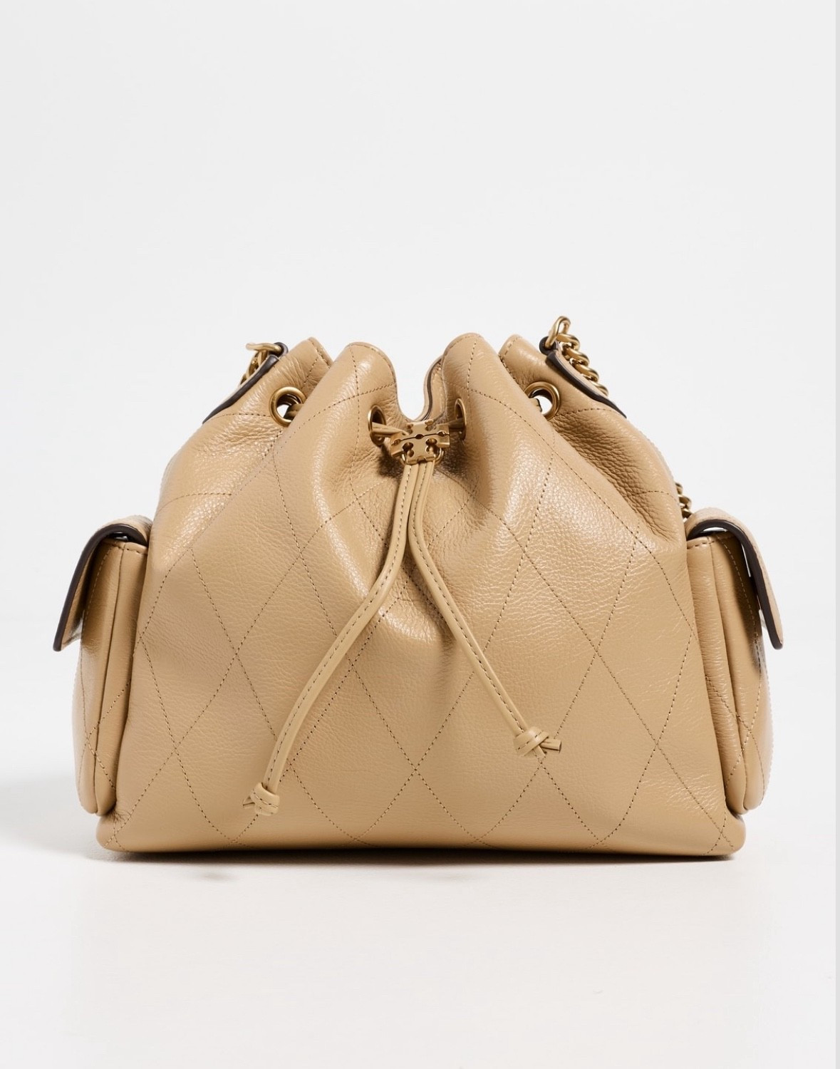 Debating on getting this bag as my new mom bag! Not sure if it will be too small though 
Tory Burch Charlie Drawstring beige