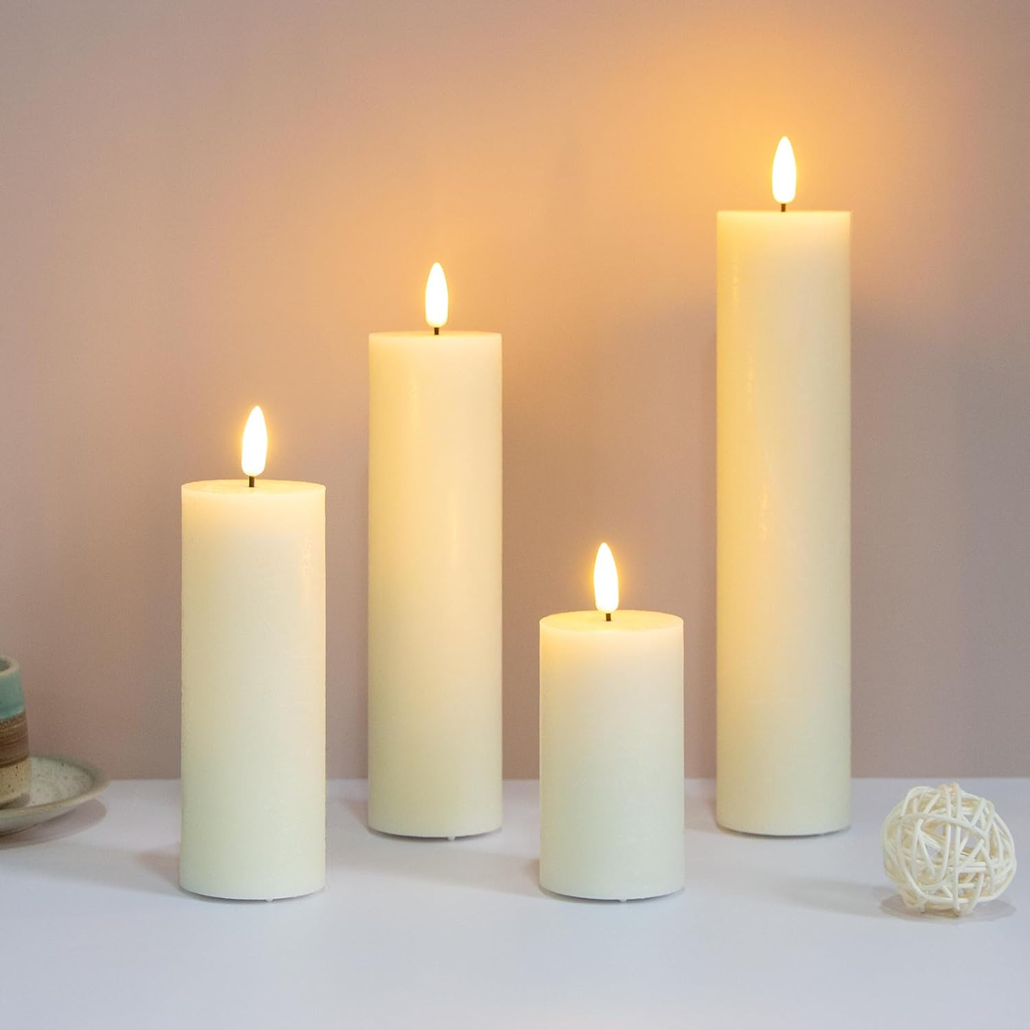 Flickering Flameless Pillar Candles with Remote Control and Cycle Timer,Ivory Pack of 4 Battery O... | Amazon (US)
